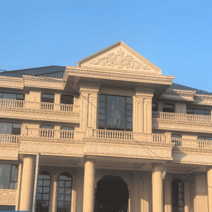 娄底黄金麻别墅外墙干挂石材效果示例