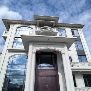 娄底白麻别墅外墙干挂石材效果示例