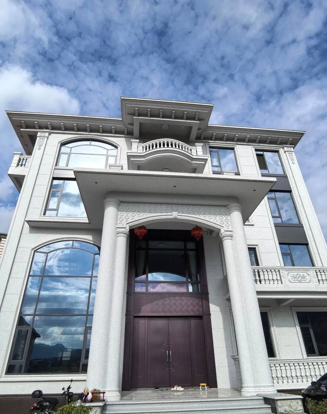 娄底白麻别墅外墙干挂石材效果示例